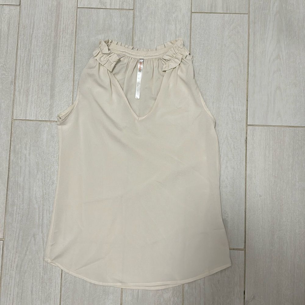 Reneec cream blouse small
